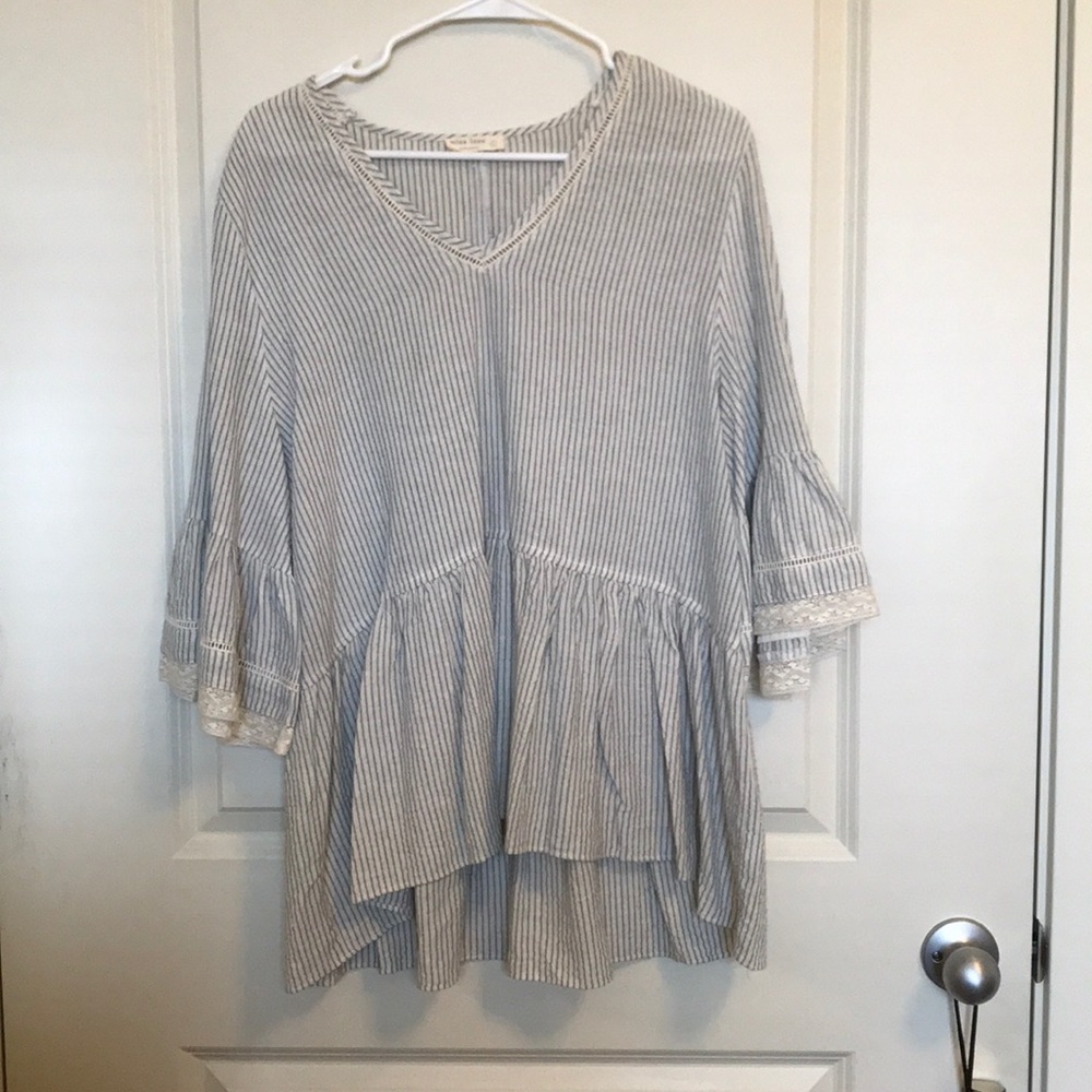 Beautiful striped flowy woman’s shirt